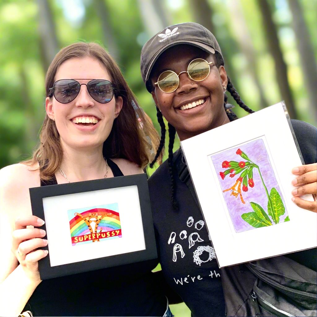 two women holding Superpussy art prints