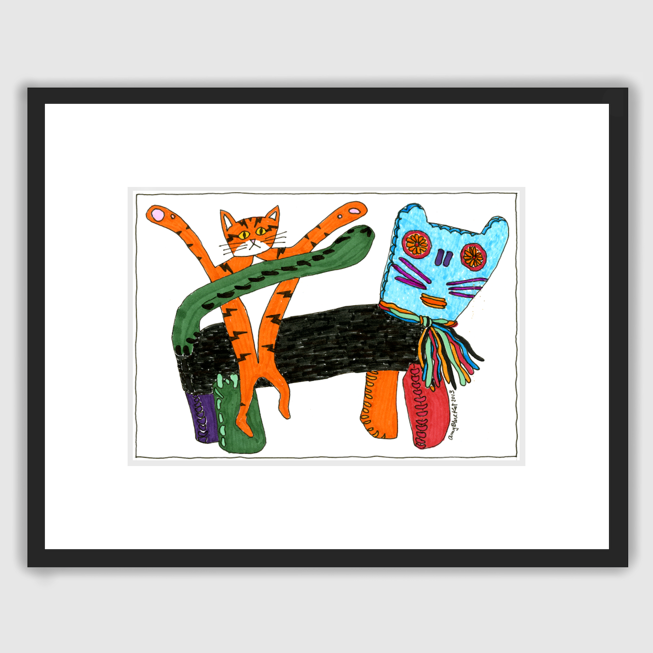 A fun framed cat art print features Superpussy-an orange cat with black stripes like lighting bolts and his paws in the air-sitting on his plushie cat friend Milandro. Milandro has a black body and four different colored paws: purple, green, orange, and red. His tail is green. His head is light blue. His whiskers are purple. and his scrarf is all the colors!