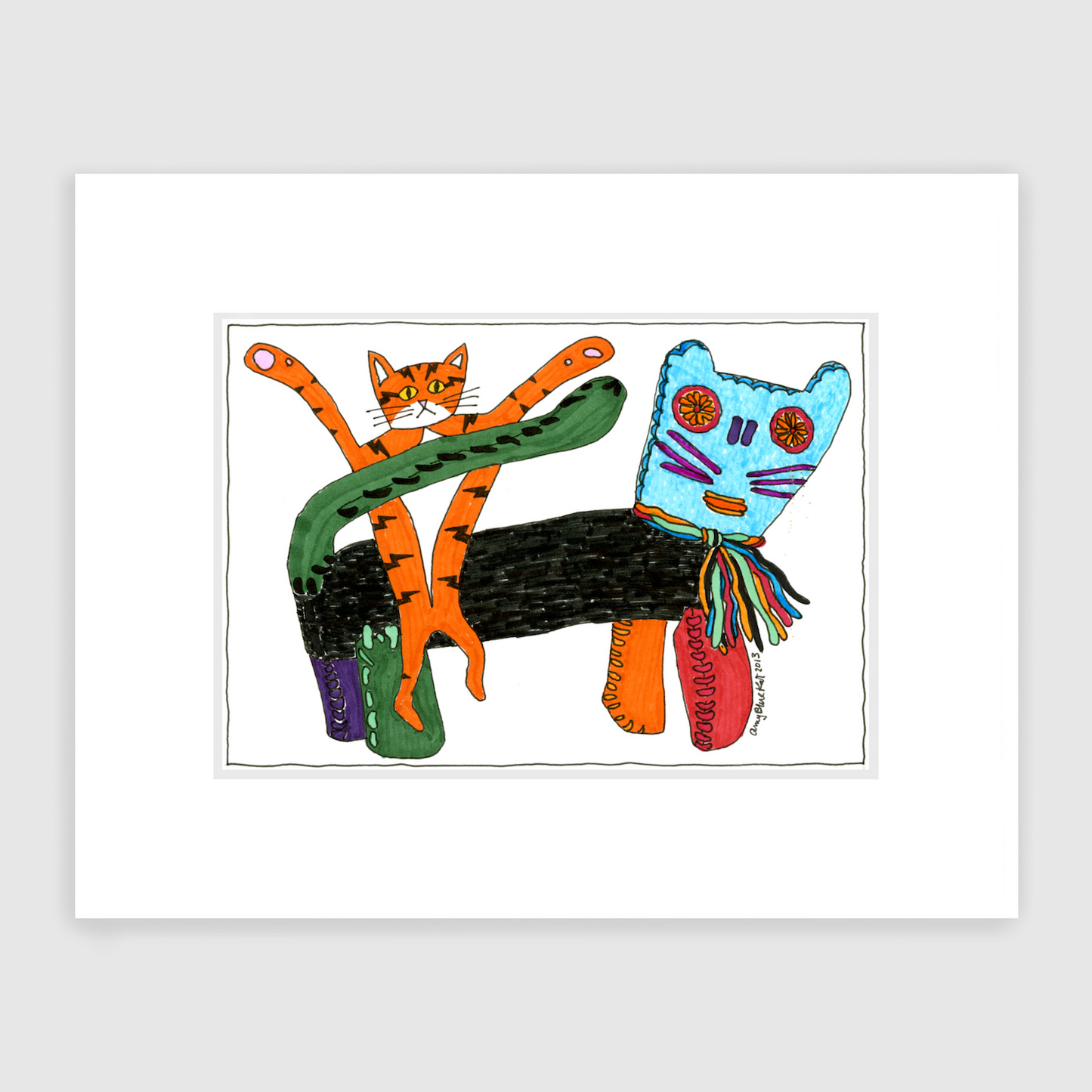 A fun cat art print features Superpussy-an orange cat with black stripes like lighting bolts and his paws in the air-sitting on his plushie cat friend Milandro. Milandro has a black body and four different colored paws: purple, green, orange, and red. His tail is green. His head is light blue. His whiskers are purple. and his scrarf is all the colors!