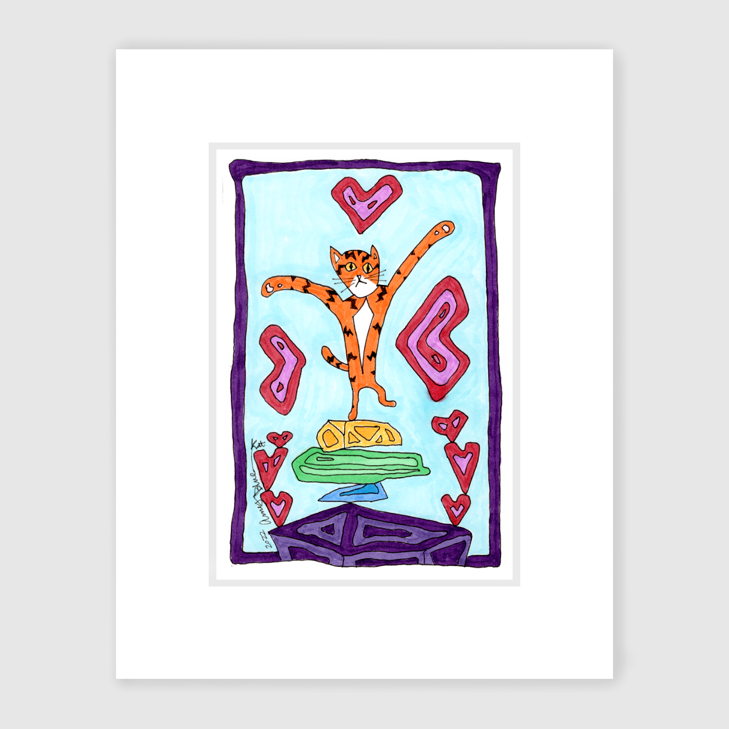 Matted  cat art on a featuring a rock cairn of the chakra colors. 