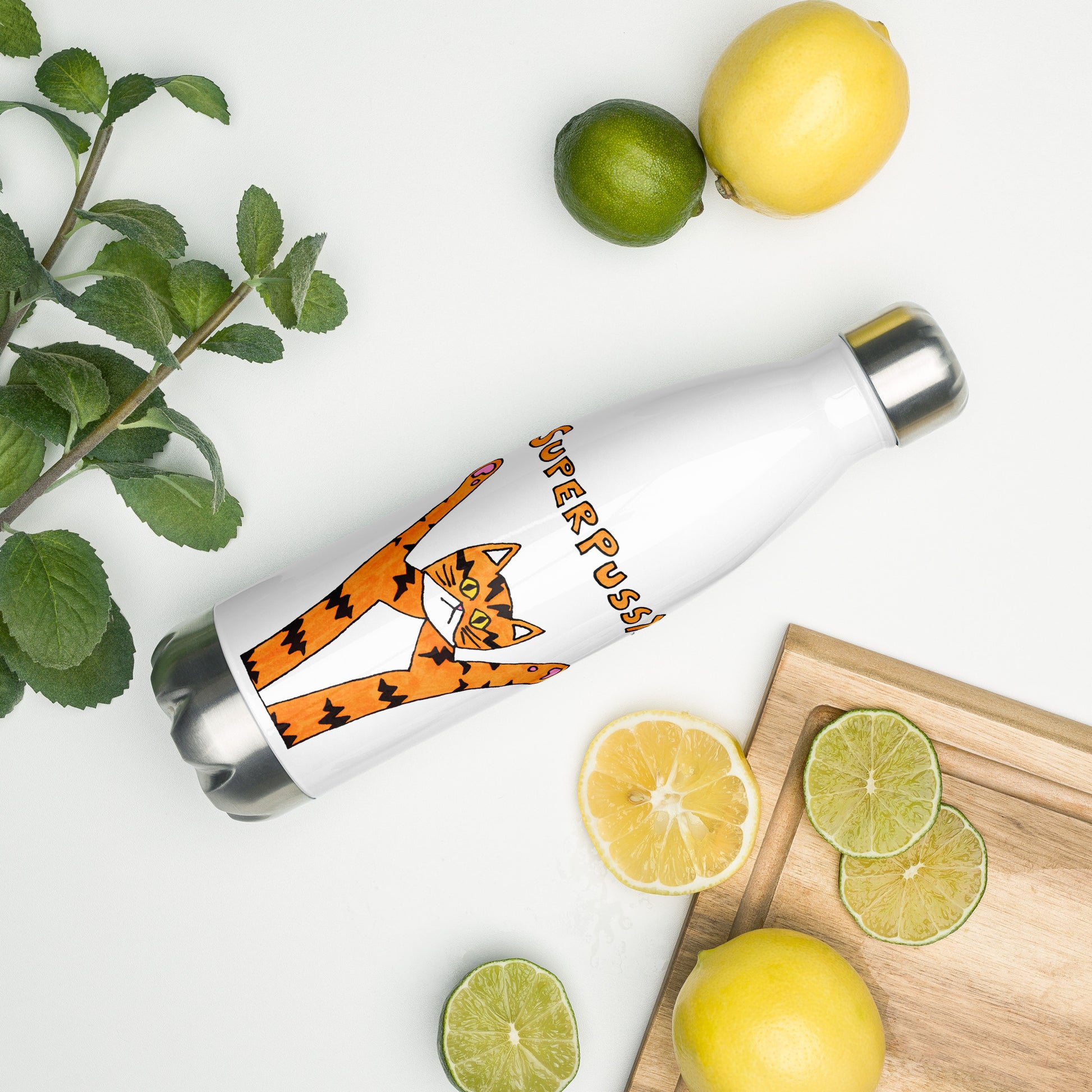 a white stainless steel water bottle with a steel-colored bottom and lid. On it is a drawing of an orange cat with black stripes and his paws in the air. Above him is his name in orange- "Superpussy". This bottle is laying on a kitchen counter beside a cutting board with sliced limes and lemons.