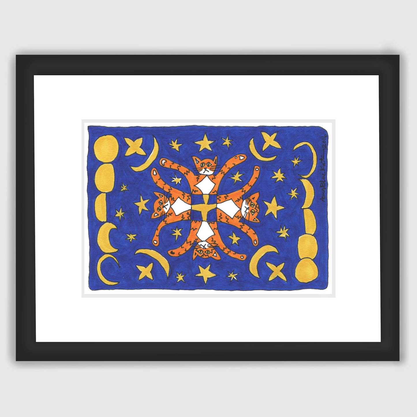A framed art print of a whimsical drawing featuring Four Superpussy's-an orange tabby cat-- In a kaleidoscope pattern. They are on a midnight blue background with yellow stars and moons around them, as if in the night sky.
